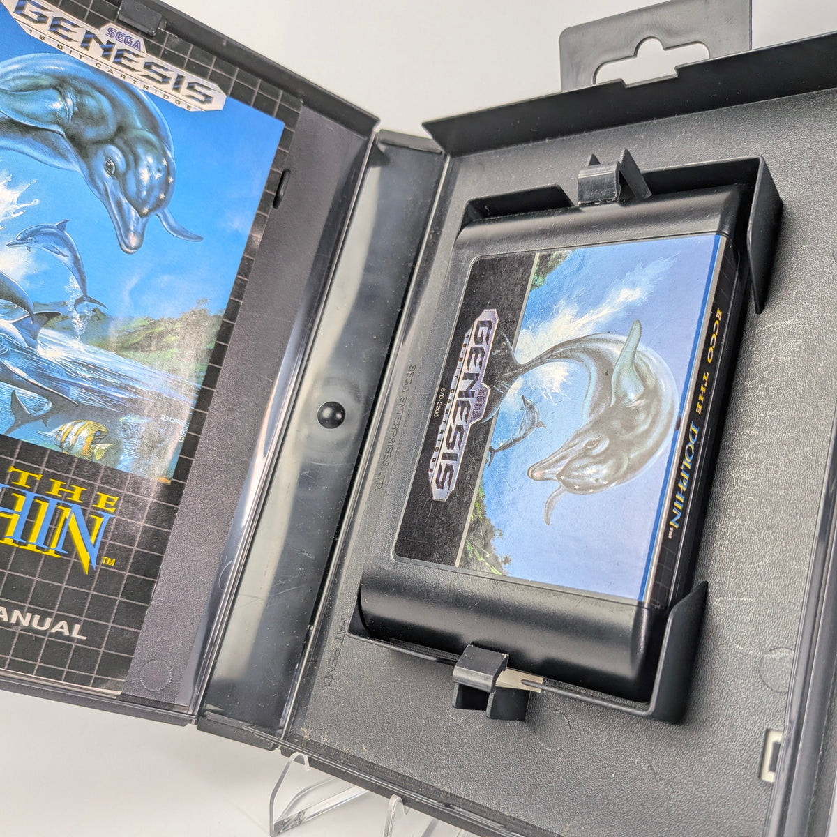 Sega Genesis cartridge with packaging featuring 'The Pin' game on a white background