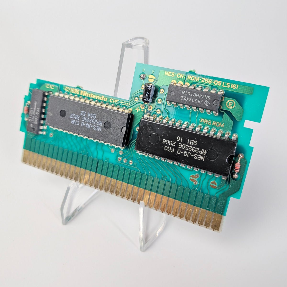 Computer memory module on a stand with a white background