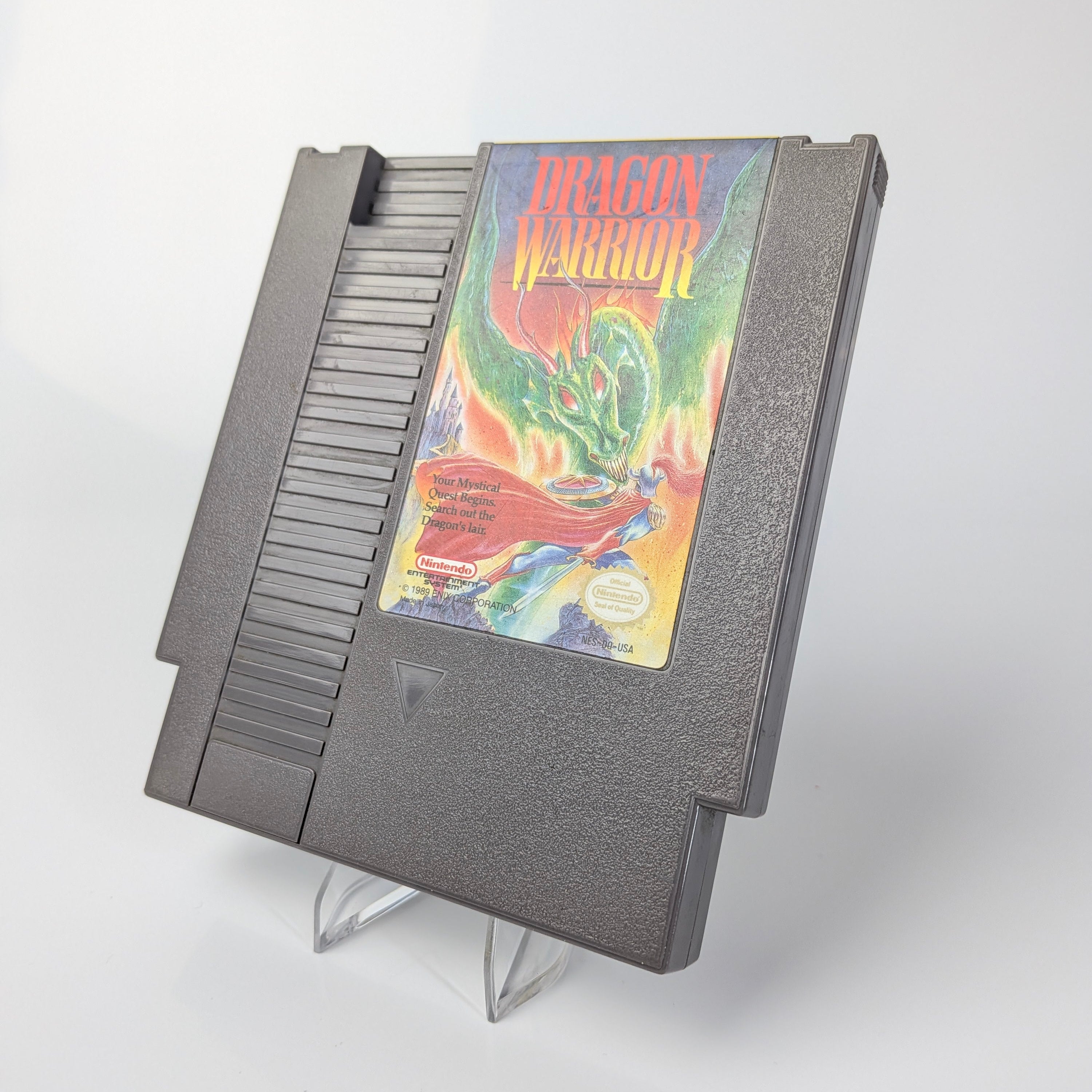 Nintendo Entertainment System game cartridge with 'Dragon Warrior' on a white background