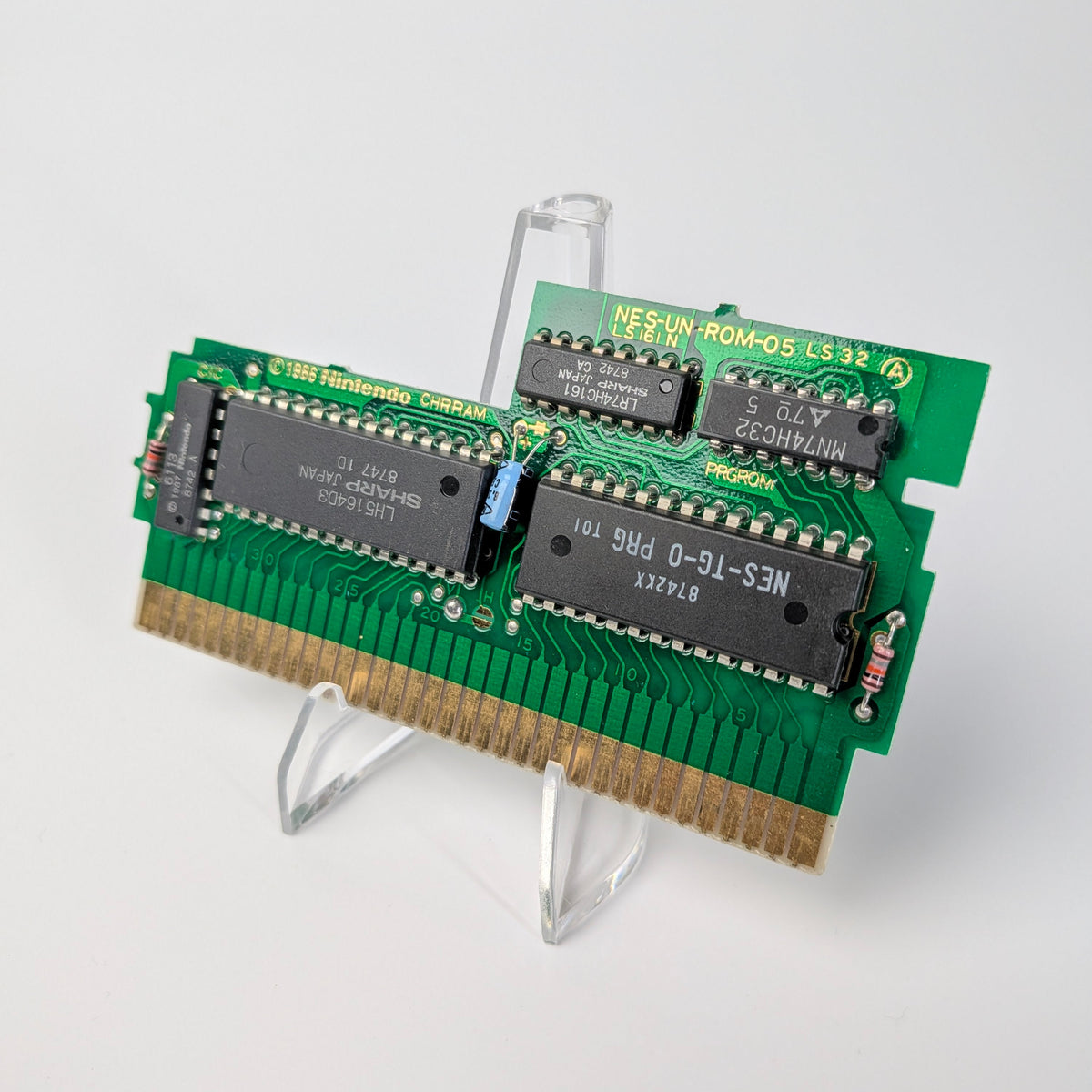 Computer memory module on a stand with a white background