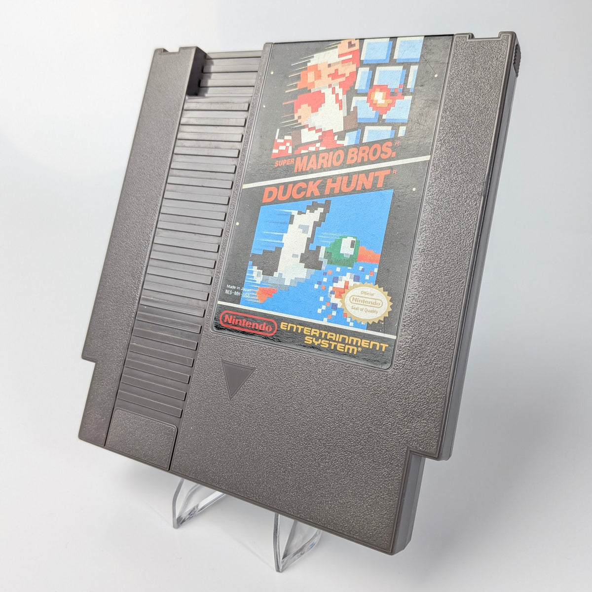 Nintendo Entertainment System game cartridge with 'Duck Hunt' on a white background
