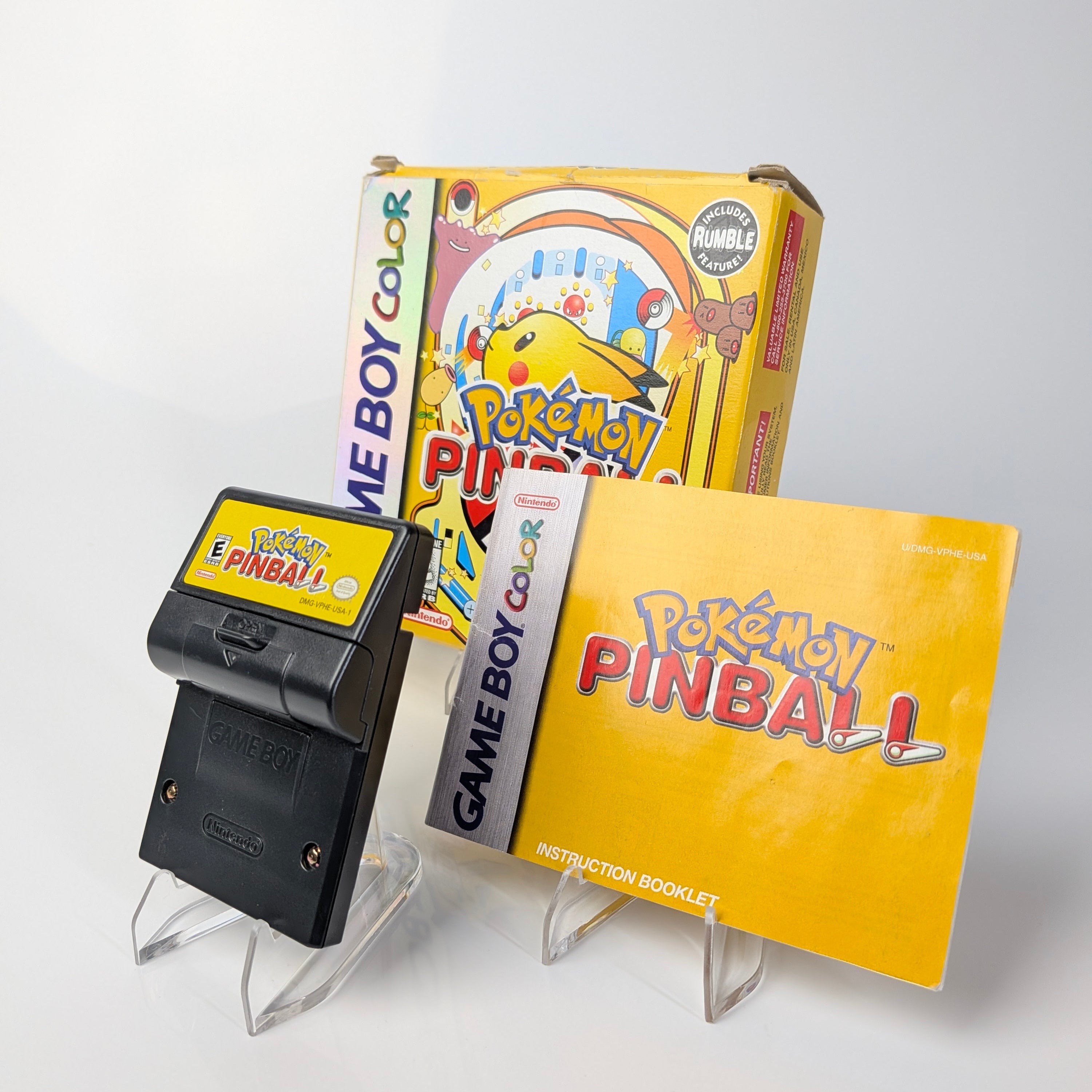 Game Boy Color cartridge and packaging for 'Pokémon Pinball' on a white background