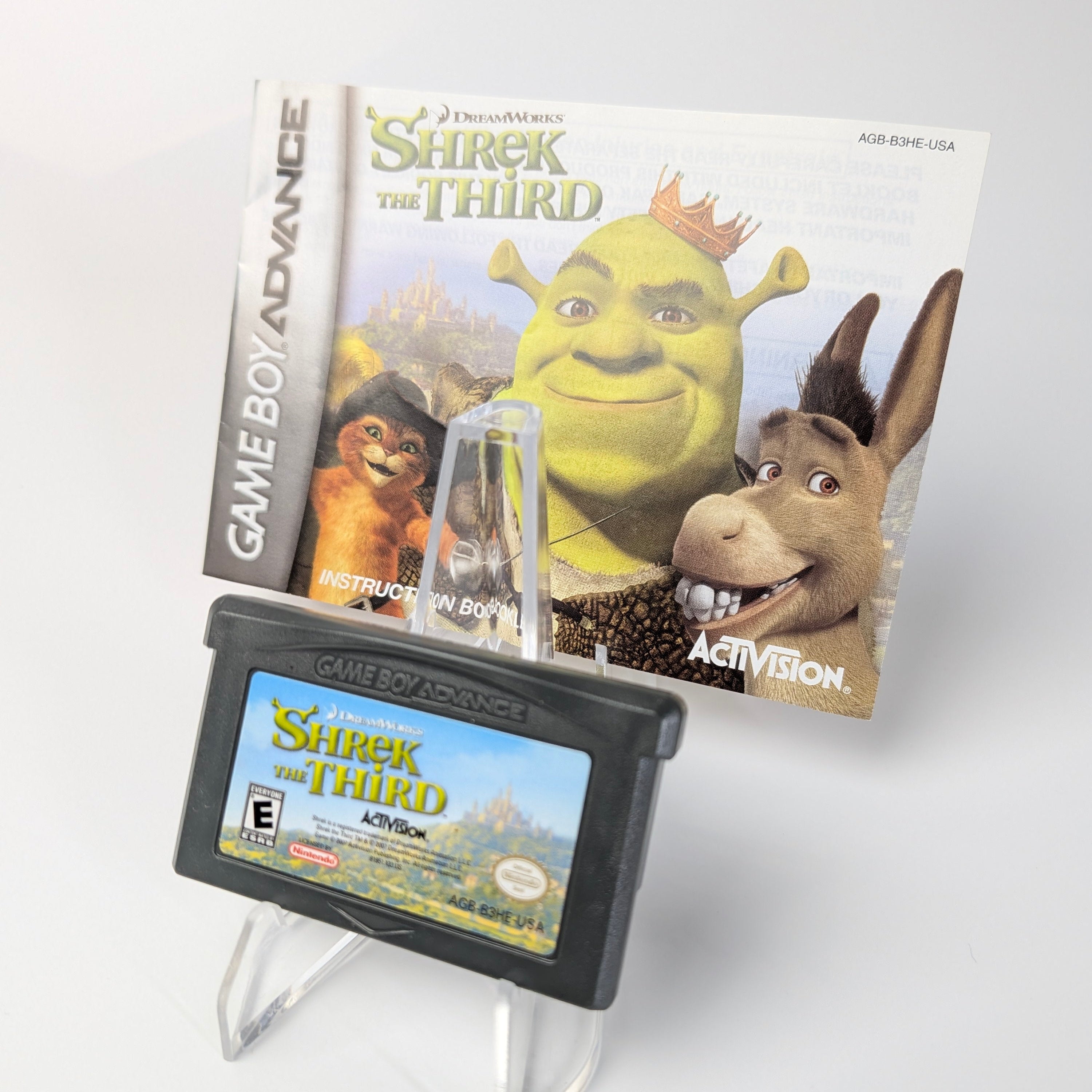 Shrek the Third Game Boy Advance game cartridge with manual on a white background