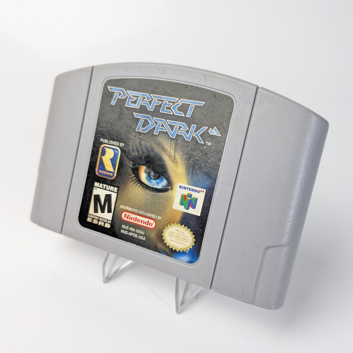 Nintendo 64 game cartridge for 'Perfect Dark' on a white background