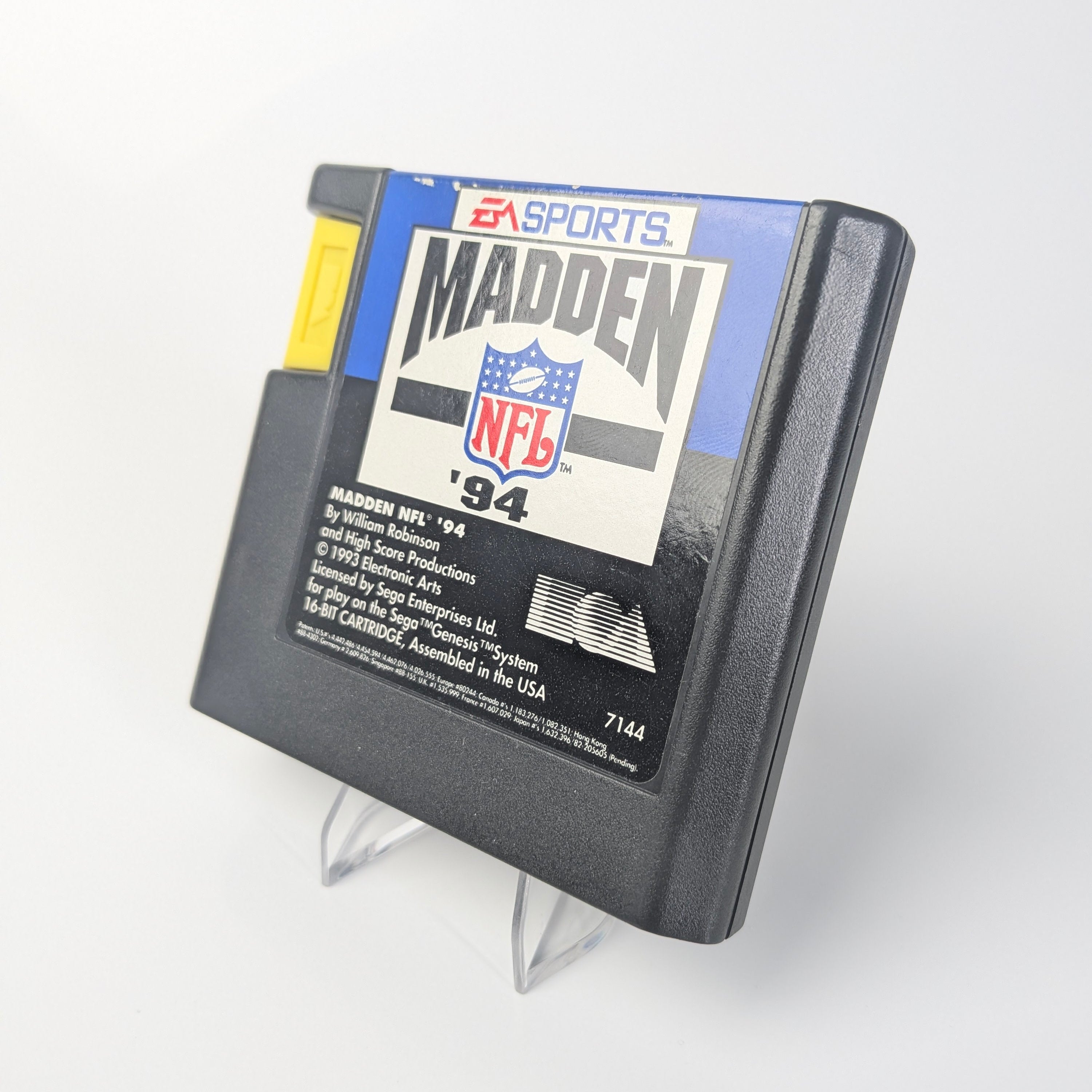 Vintage Madden NFL '94 video game cartridge on a white background