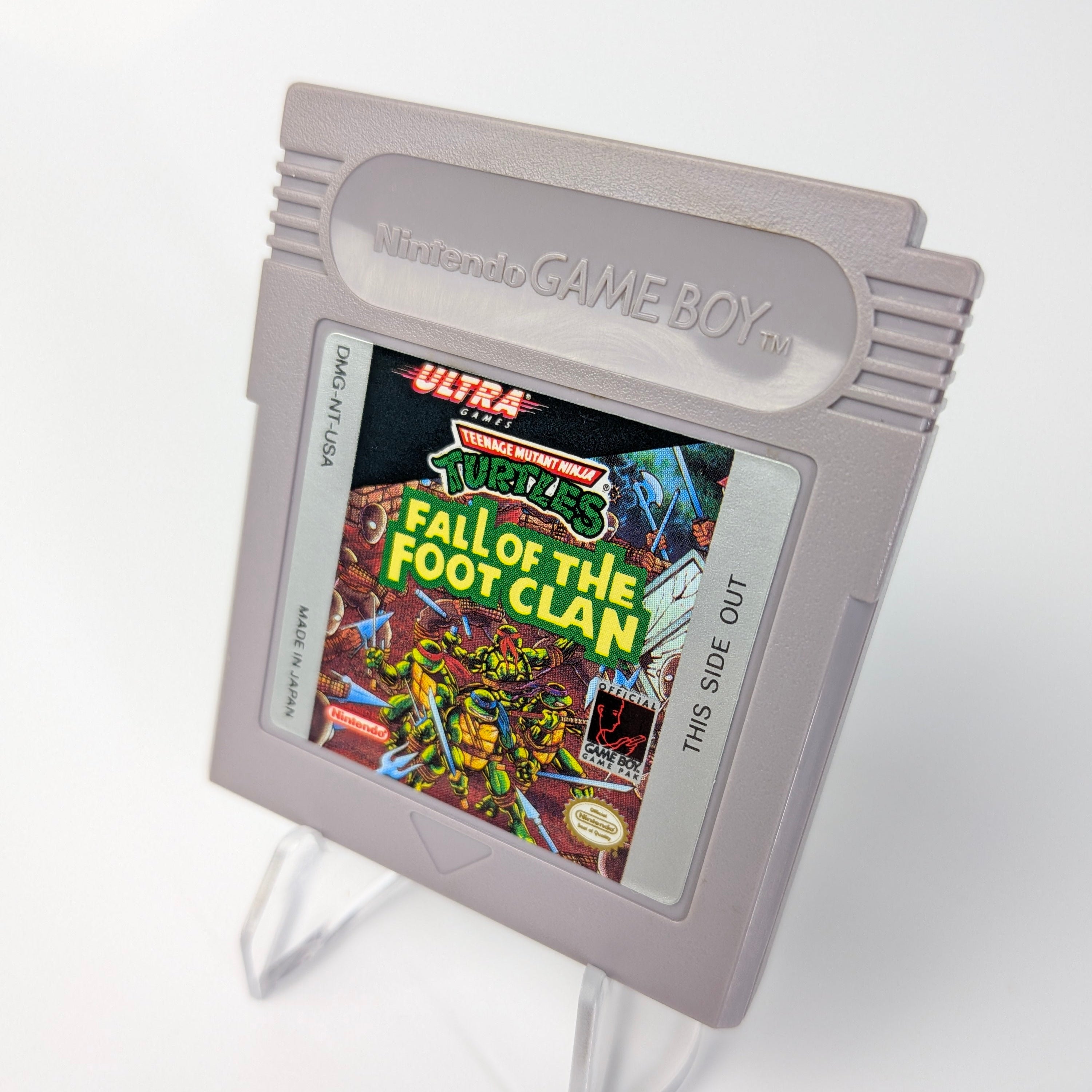 Nintendo Game Boy cartridge with 'Fall of the Foot Clan' cover on a white background