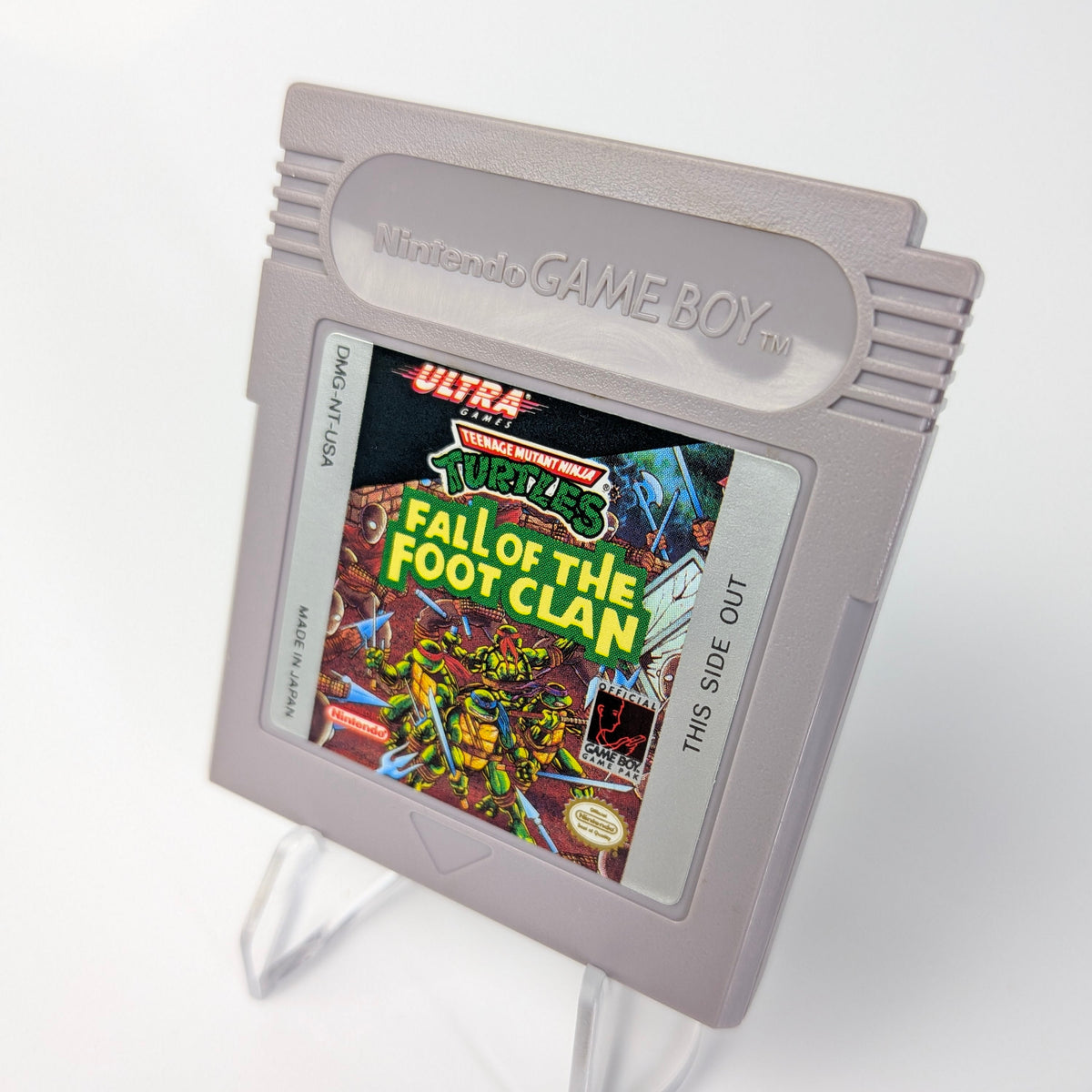 Nintendo Game Boy cartridge with 'Fall of the Foot Clan' cover on a white background