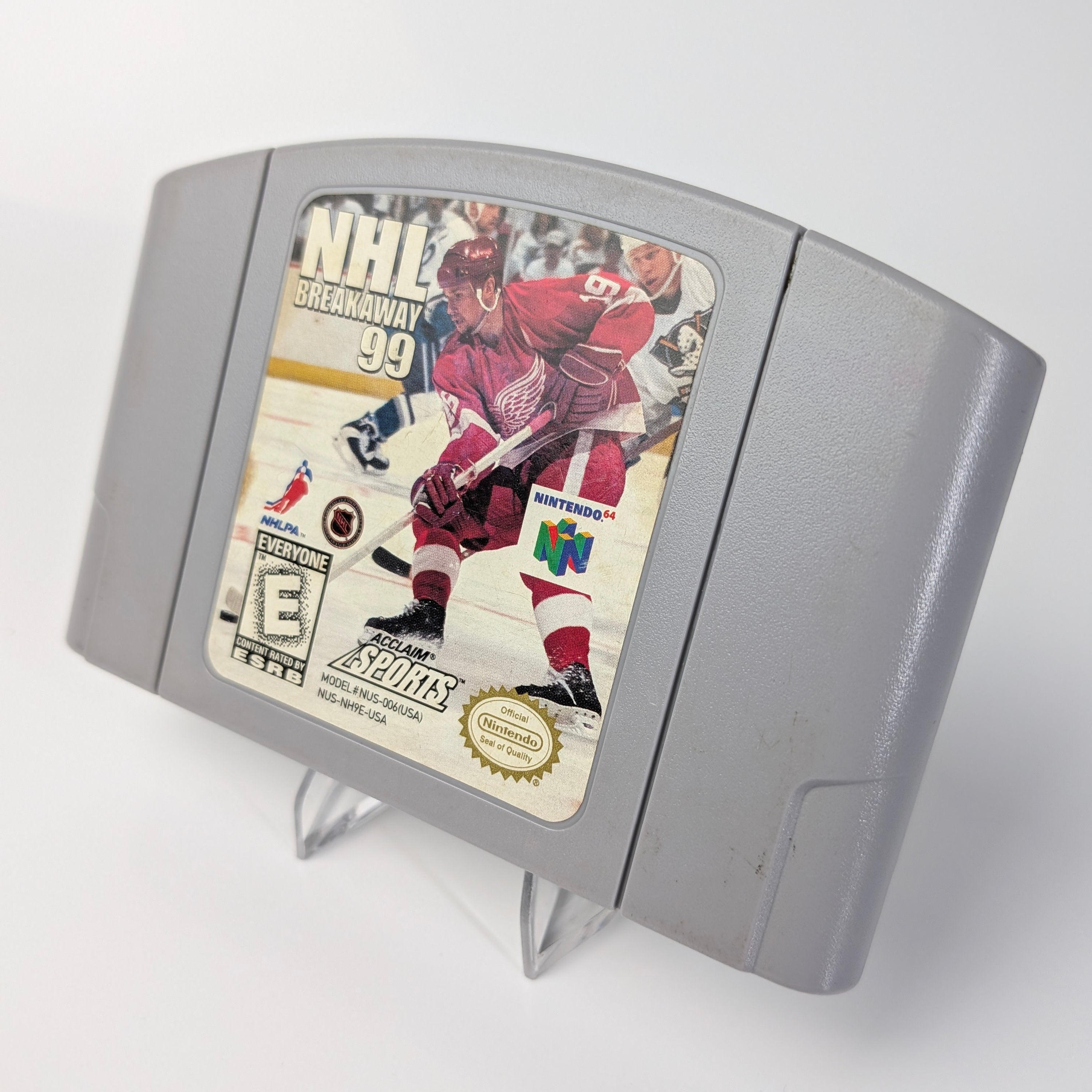 N64 game cartridge for NHL Hockey '99 on a white background