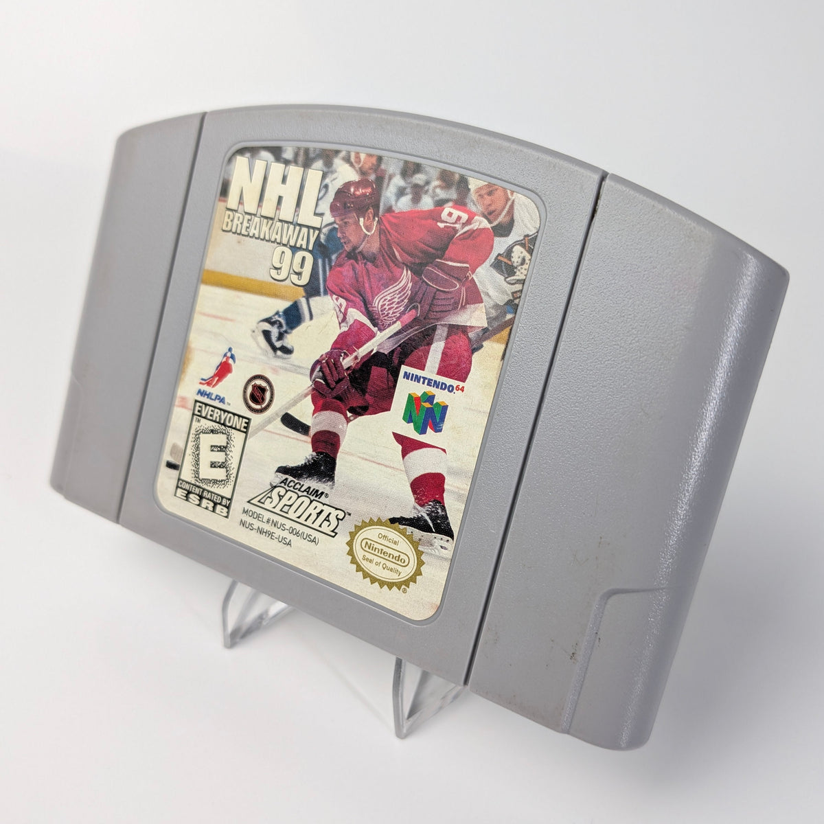 N64 game cartridge for NHL Hockey '99 on a white background