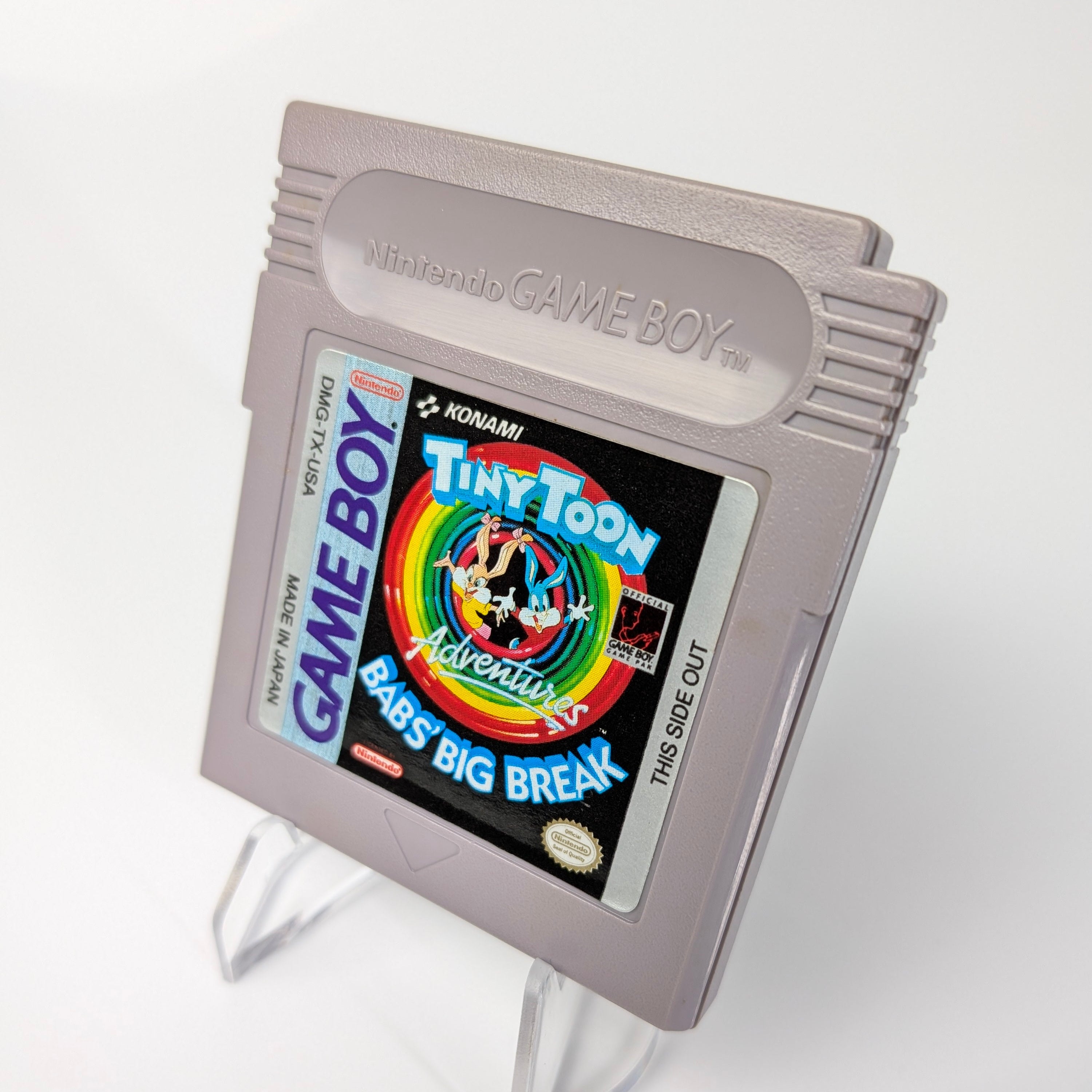 Game Boy cartridge with 'Tiny Toon Adventures' on a white background