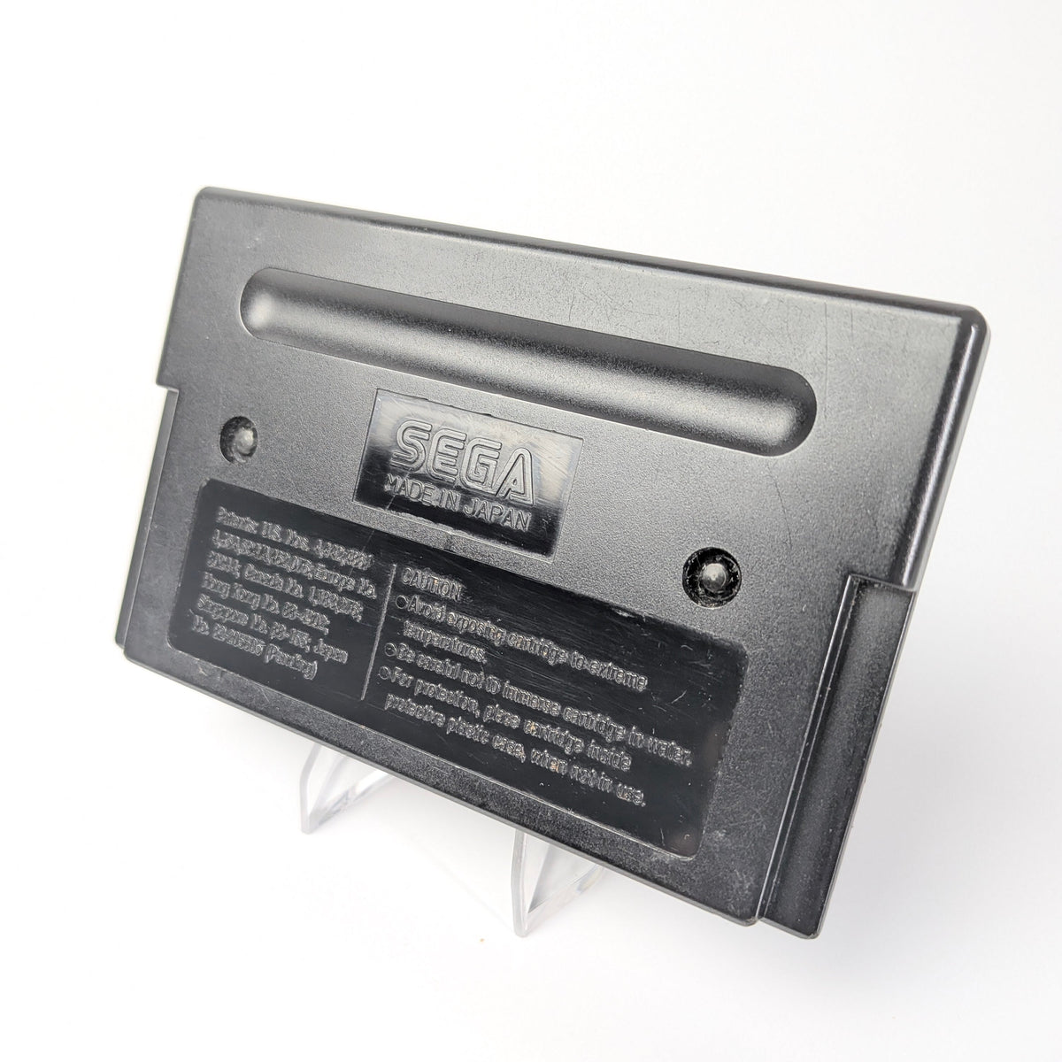 Sega cartridge on a white background