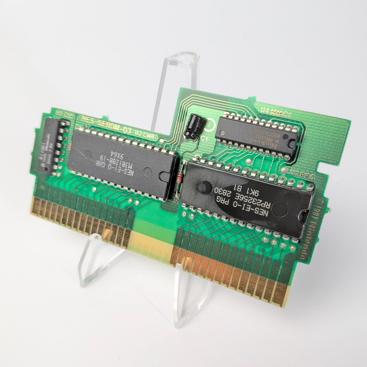 Two green computer memory modules on a white background